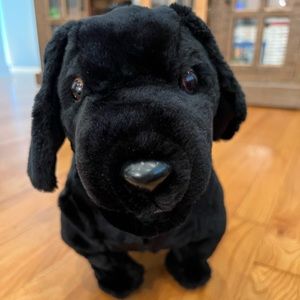 - Plush black Labrador dog battery operated